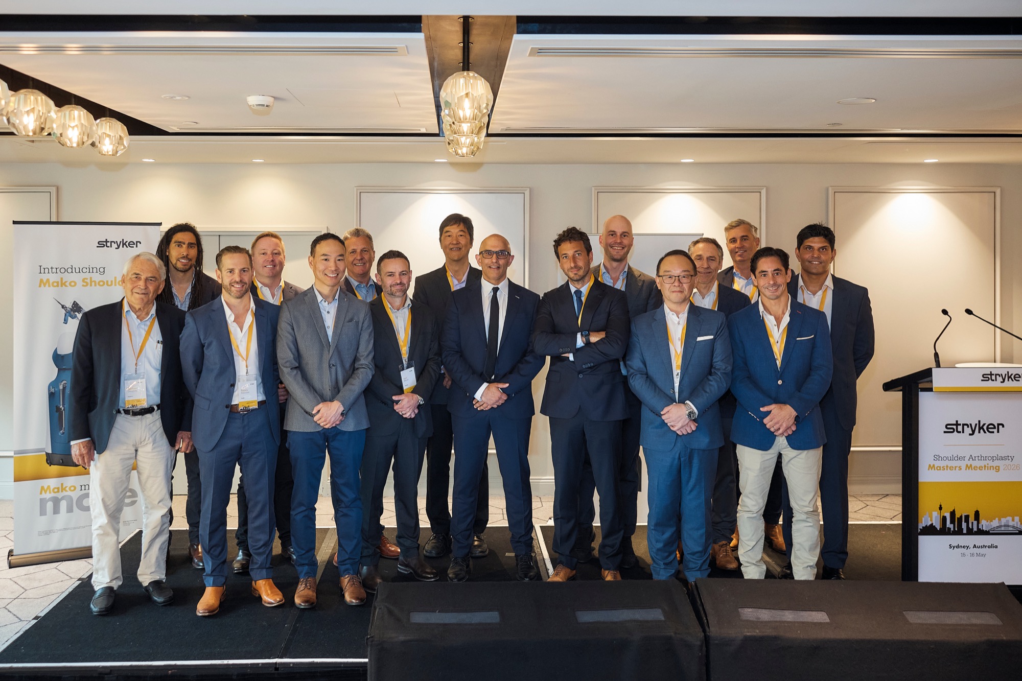Faculty of the Stryker Shoulder Arthroplasty Masters Meeting, Sydney 2026, on stage at the close of the meeting.